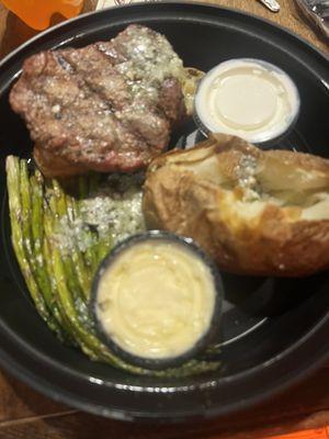 Filet mignon (medium) with a baked potato (with butter and sour cream) and grilled asparagus.