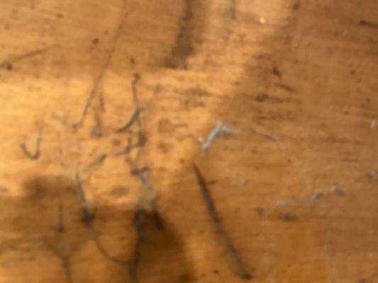 Rolls of dust on antique table in living room in Clearview was not touched at all