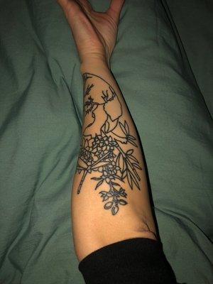 Upside down, sorry.  2 weeks new.   Outline of heart with flowers coming out.