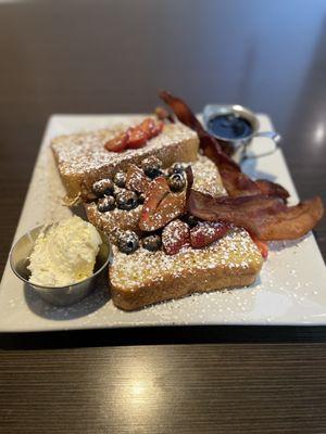 Meemoms French Toast with a side of bacon.