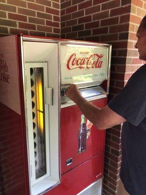 Buying a bottle of Coke for a Nickel