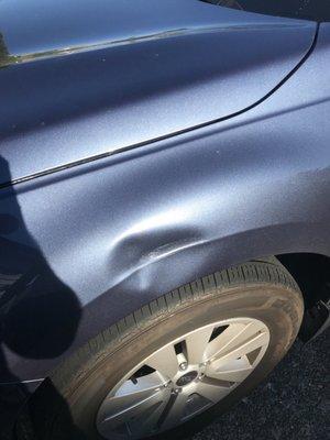 Dented car - BEFORE