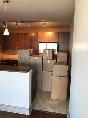 (After) We can get most belongings into professional moving boxes with ease.  We rely on larger packing materials for belongings to l...