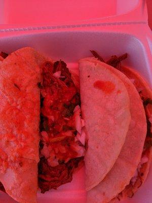 Big Birria Tacos. Red Tent lighting.