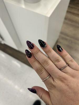 Perfect Black and Purple butterfly wing nail design!