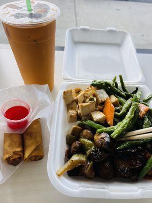 Flash fried green beans, spicy tofu and savory mushrooms, with peppers and carrots, to veggie spring rolls, and a Thai iced tea: $14.50.