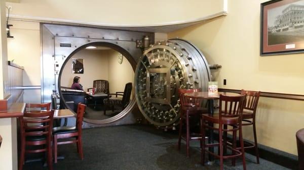 Love, love, love the bank vault couch area.