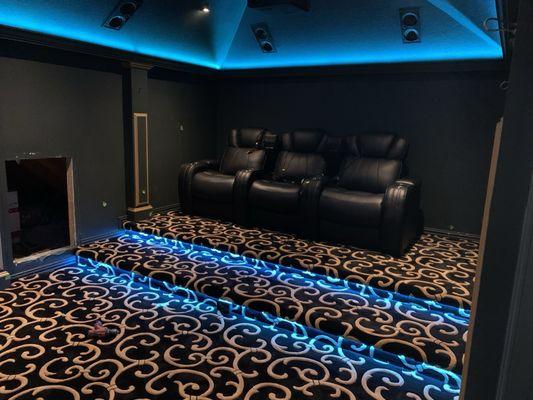 Lighting and home theater design done by Tha Media Room., Jacks carpet choosing the perfect carpet padding & carpet texture.