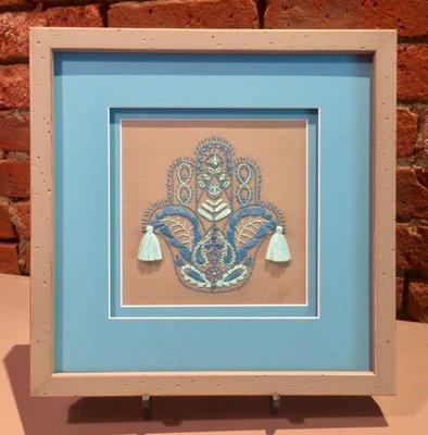 Here's an example of a small needlework piece - stretched, double-matted and protected with TruVue Museum glass!