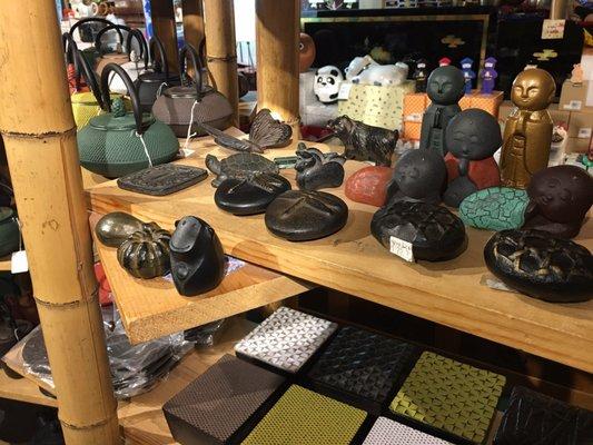 Cast iron paperweights and boxes.