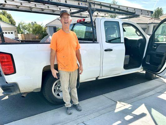 Mark next to his truck