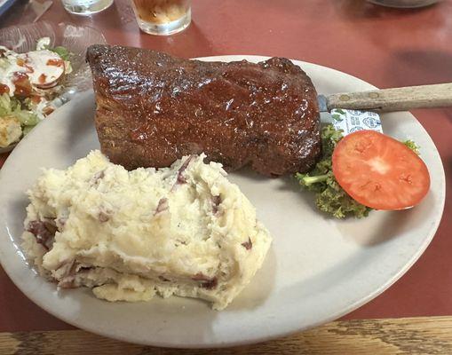 Half rack of ribs and garlic mashed potatoes