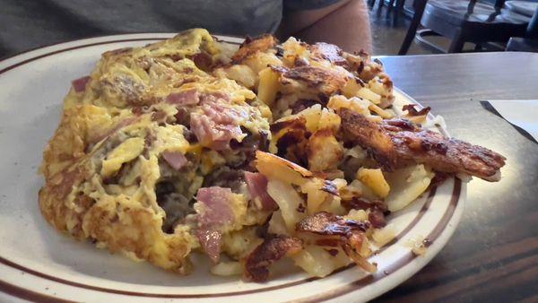 Three meat omelet and potatoes