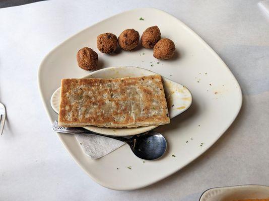 Seafood pot pie with jalepeno hush puppies.