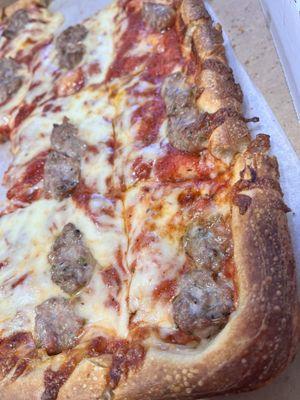 Pizza with cheese and sausage