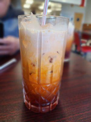 Thai tea. It's pretty good, and I think they brew it fresh tea instead of powder.