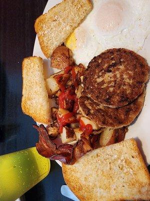 2 over easy, home fries and sausages with home made bread..