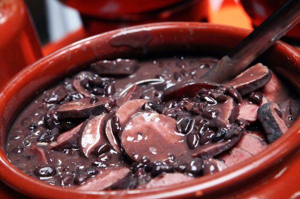 Feijoada, The most traditional Brazilian dishes, is prepared with black beans and various salted pork, sausage and beef meats.