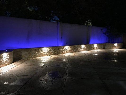 Backyard improvements. Stamped concrete, retaining wall and light fixtures.