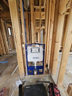 This is a TOTO wall mounted toilet we installed on a new construction plumbing job.