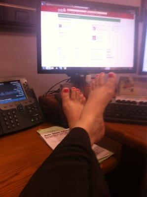 Kickin back at work after a great pedicure worth the 25 dollar