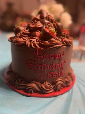 Chocolate cake with chocolate ganache filling, chocolate buttercream, with chocolate covered strawberries!