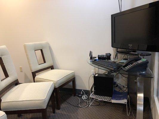 Dr. Kaur believes in holistic dentistry. This is the photography room where a patient's pictures are taken before an after treatment.