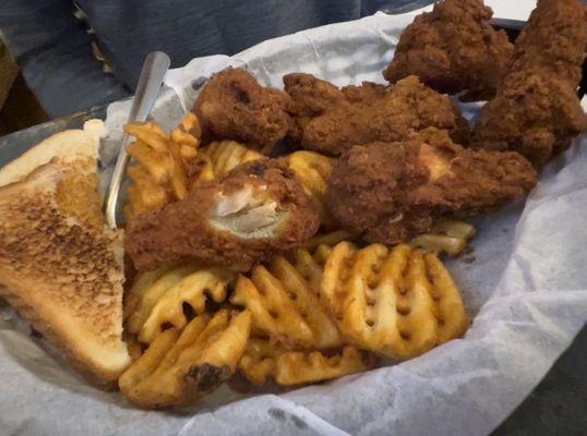 Buffalo chicken wing basket with upgrade to waffle fries & seasoned sour cream ($9.25)