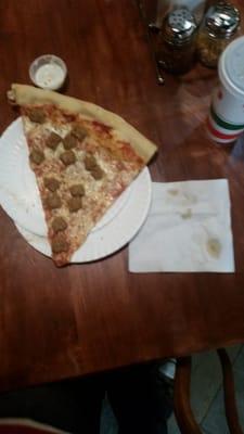 Massive slice of pizza from Abo's pizza. (Napkin for scale, sorry... I didn't have a banana.)