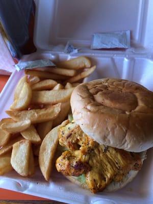 I got the grilled chicken sandwich and it was fantastic! Juicy pieces of chicken grilled and marinated in like a saffron/curry