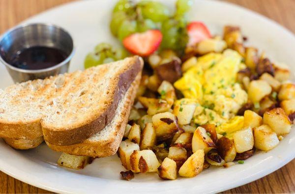 "The Usual" Eggs. Came with choice of white or wheat toast, house jam with fresh blueberries. Potato hash $3 add on.