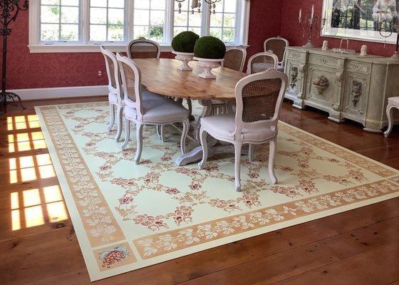 Custom floorcloth made to perfectly complement the appointments in this french country dining room.