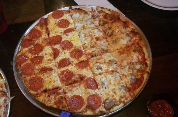 Village Pizza in Carpentersville Route 25 location. Large thin crust sausage and pepperoni.