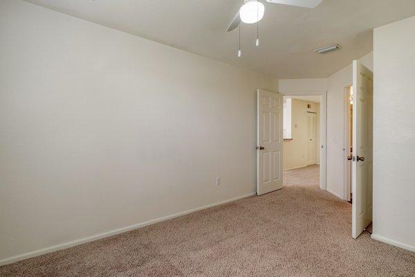 Bedroom with carpet flooring and multi-speed ceiling fan