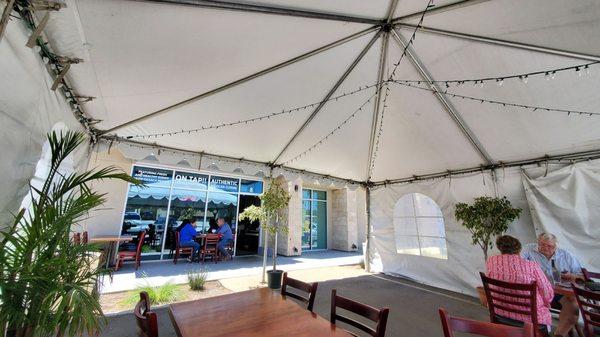 Also a tent is setup for pleasant outside dining.