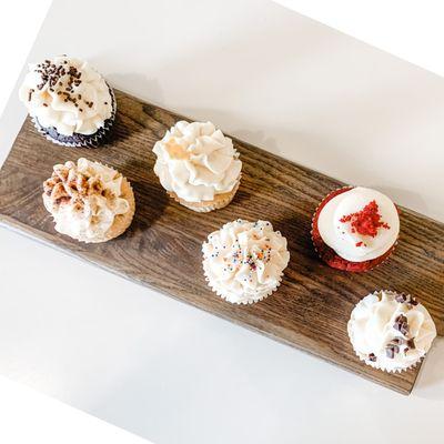 We have an assortment of cupcake flavors in the shop which change weekly, or you can order cupcakes by the dozen online!