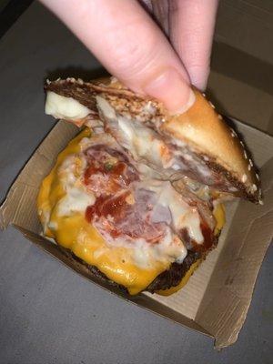 Quarter pounder deluxe ....I wasn't given any pickles and the tomatoes I go we're small and one of them was the top of the tomato