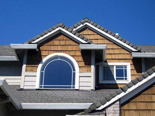 SFW Construction assists with the cedar siding repairs.