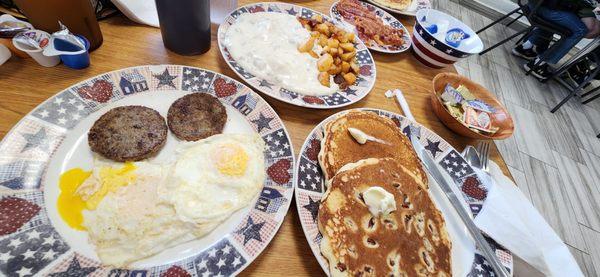 The Short Stack: 2 eggs.sausage patty, 2 pancakes. The biscuits & gravy, side of bacon are ala carte. All +-$18.00. Yum.