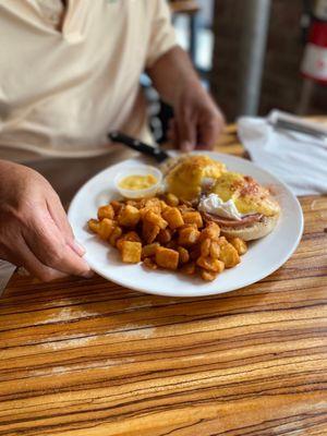 Eggs Benedict with country potatoes