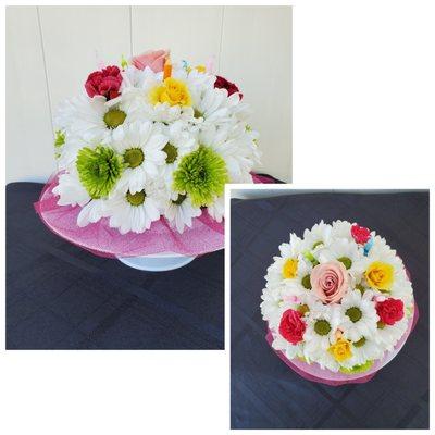 Our pretty fresh floral birthday cake comes on its own stand and in a box with a bow. $55.00