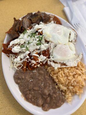 Chilaquiles with some chicharron! Honestly all food was amazing, 15 tacos later still want some more  Agua de fresa was amazing too