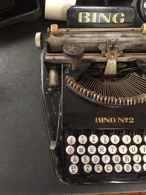 Antique typewriter on display.