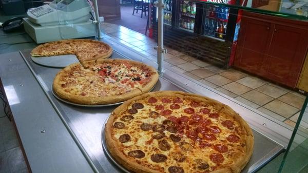 Fresh dough made daily with Italian dinners, subs, salads, and delicious slices! Check out the best prices in town!