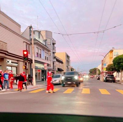 My pup experienced his first Santa Con in the Marina the other day. 2drunk Santas reached into our car window to pet him. Lol.