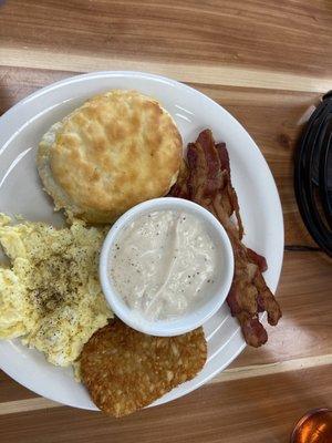 Biscuit, gravy, bacon, scrambled eggs