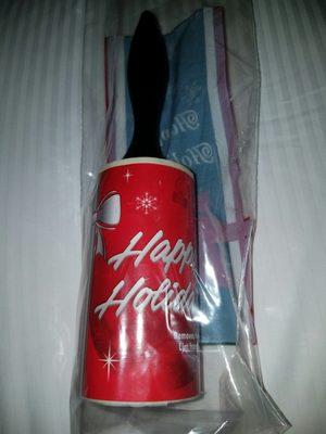 How cute, they give customers a lint roller - Happy Holidays!