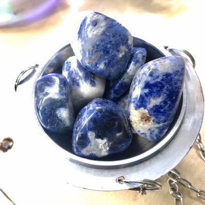 Tumbled blue stones in a nice silver bowl