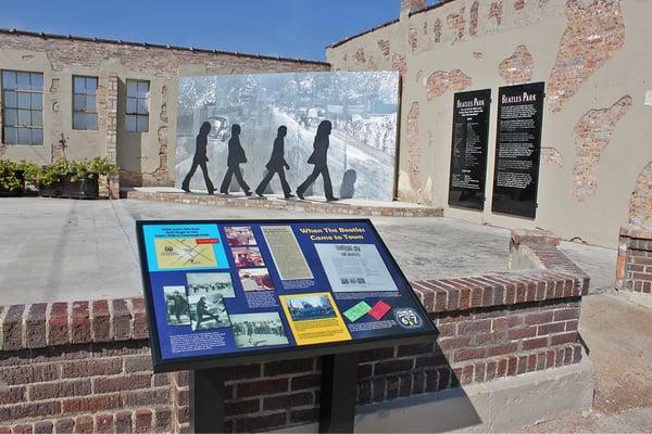 The plaque shows some of the actual photos from The Beatles 1964 stop-over.