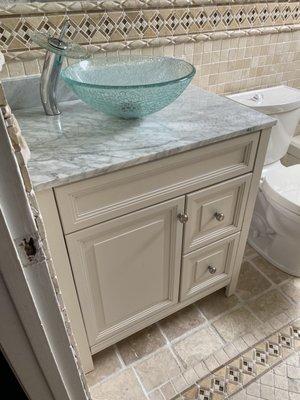 Vanity, countertop, sink bowl, and waterfall faucet all purchased from Home Depot. Jeremy of JLB Plumbing did the total install.